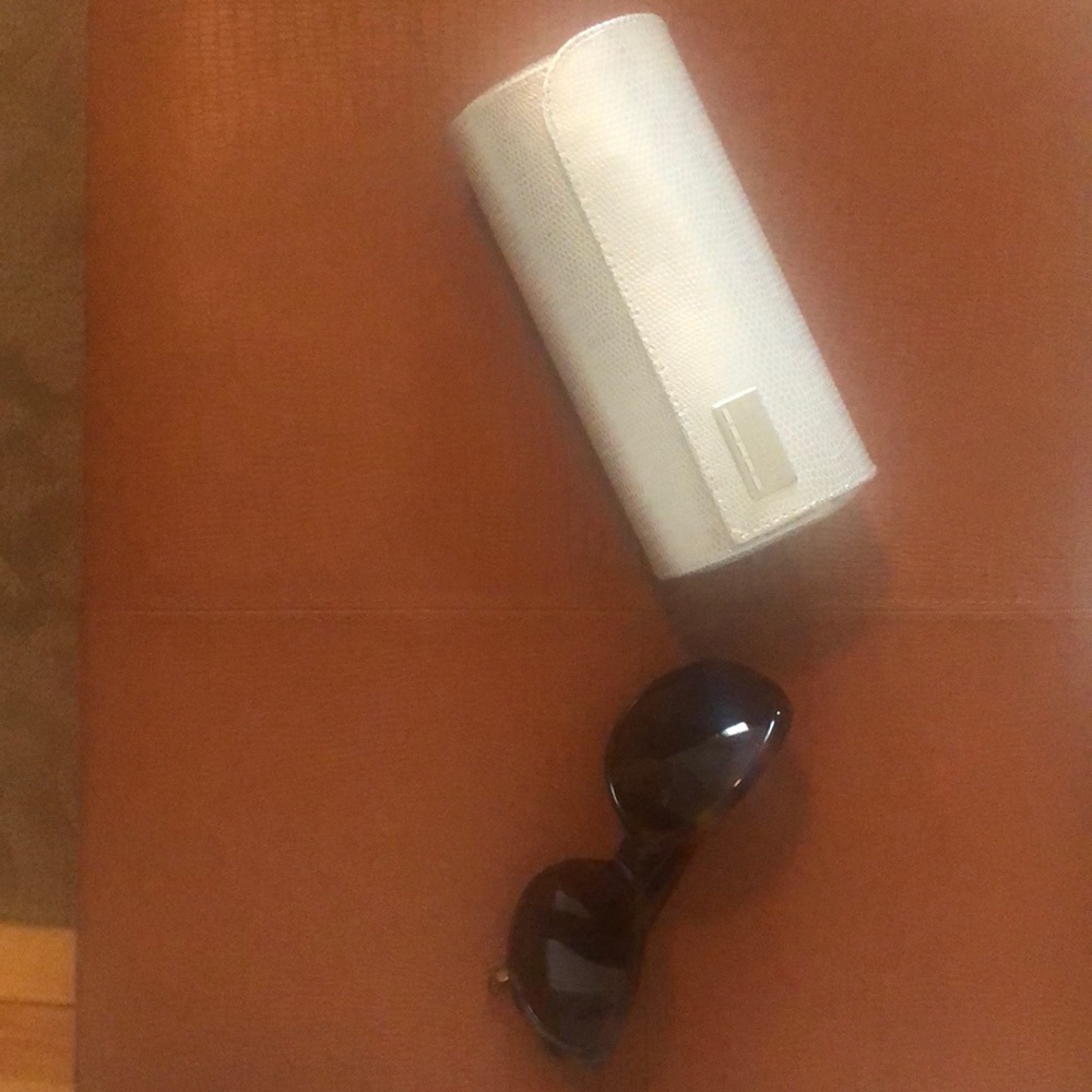 Judith Leiber large oval sunglasses.